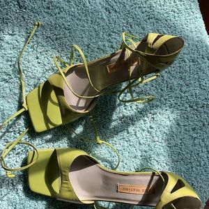 Box toe ankle tie sandals.